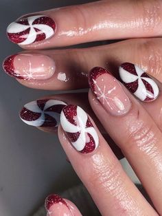 Festive Almond Christmas Nails 2023: 15 Ideas for a Merry Holiday Look Candy Cane Swirl Nails, Black Candy Cane Nails, Cristmass Nails 2023, Candy Cane Nail Designs, Almond Christmas Nails, Christmas Candy Nails, Christmas Nail Ideas, Nail Goals