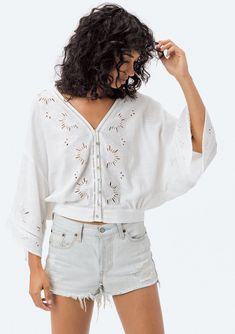 Embroidered Eyelet Button Front Top | LOVESTITCH Tops Casual V-neck Eyelet Blouse, Spring Festival V-neck Peasant Top, Summer Festival Peasant Top With V-neck, Summer Festival V-neck Peasant Top, Spring Bohemian Half-sleeve Blouse, Spring Bohemian Half Sleeve Blouse, Bohemian Half Sleeve Blouse For Spring, Summer V-neck Top With Eyelet Detail, Summer V-neck Eyelet Top