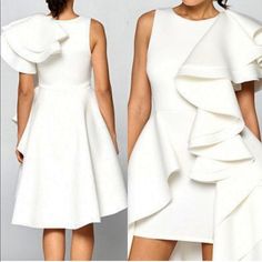 This Dress Is Everything Stylish Sexy And Glam It Has A Wow Factor. Great 8 Percent Stretch Made With Scuba Material That’s Above The Knee Length. White Knee-length Mini Dress With Ruffle Hem, White Ruffle Hem Midi Dress For Evening, Fitted White Mini Dress With Ruffles, White Ruffled Midi Dress For Party, White Ruffled Party Dress, White Ruffled Evening Dress, White Party Dress With Ruffle Hem, White Ruffle Hem Party Dress, Elegant White Mini Dress With Ruffle Hem