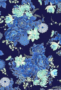 blue and white flowers on a dark background