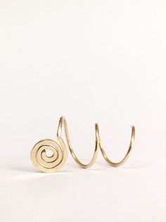 Gorgeous spiral threader earrings. Minimalist, comfortable, perfect for everyday use. The earrings are sold as single or as a pair of your choice and in 14K gold filled or sterling silver 925, see variations in drop-down menu. Measures: Each ear hoop is 9mm diameter. For different size, please contact us. How to use: 1. Adjust spiral width to much your piercings. 2. Insert the earring to first hole and then twist throw each hole. Made to order. Will arrive in a pretty gift box ready to give or k Adjustable Spiral Hoop Earrings, Metal Spiral Wrap Earrings, Spiral Metal Wrap Earrings, Metal Spiral Wrap Single Earring, Spiral Cartilage Earrings As Gift, Hoop Earrings Piercing, Triple Piercing, Gold Threader Earrings, Ear Threader