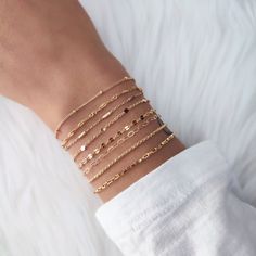 "Dainty, Adjustable, Tarnish Resistant Gold Bracelets. Super cute and lightweight bracelets with a sparkly, reflective finish. Each bracelet is perfect to wear alone or in combination with other bracelets. ◾ Length - 6.5\" + 1\" Extender Chain ◾ Material - Gold Filled/ Micron Plating (See details below for each style) ◾ Will not tarnish, Safe to use in regular water ◾ Pick your bracelet in the style menu ◾ For ordering multiple different bracelets, add to the cart each selection individually ◾ L Fine Bracelets Gold, Permanent Bracelet Stack, Dainty Bracelet Stack, Short Silver Necklace, Water Pick, Silver Necklace Simple, Dainty Gold Bracelet, Permanent Jewelry, Silver Bracelets For Women