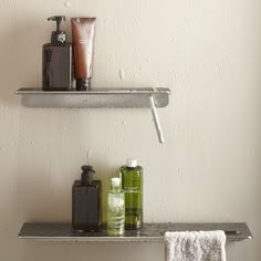 two shelves with soap, lotion and hand sanitizers on them