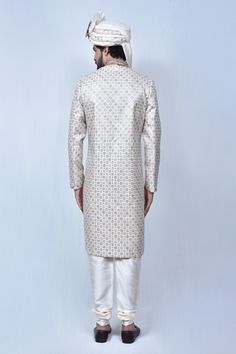 Multicolor sherwani with floral embroidered motifs and welt pocket in front. Comes with cream churidar.
Components: 2
Pattern: Embroidery
Type Of Work: Thread
Neckline: Mandarin Collar
Sleeve Type: Long
Fabric: Art Silk, Silk Blend
Color: Multi Color
Other Details: 
Welt pocket in front
Slits on the sides
Closure: Button front
Note: The mala and safa worn by the model is not for sale
Occasion: Groom - Aza Fashions Embroidered Motifs, Rohit Bal, Tarun Tahiliani, Thread Art, Pattern Embroidery, Color Art, Fashion App, Silk Embroidery, Churidar