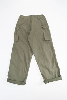 We've been waiting on these all Spring. After acquiring the 6-pocket and easy cargo, we kept saying to ourselves, "We need a wider fit too." This is about as wide as it gets for an orSlow cargo. They're a repro of an Army cargo pant using the same fabric and buttons you loved so much from the M-43 HBT Jacket. It's a medium-weight herringbone in olive drab or "army green." The buttons are incredible black-coated starred metal with a bit of the paint already chipped off for you. These pants are ro Military Trousers With Side Pockets, Military Style Trousers With Side Pockets, Khaki Full-length Cargo Jeans With Side Pockets, Military Style Full-length Parachute Pants With Pockets, Military Full-length Parachute Pants With Pockets, Full Length Khaki Cargo Jeans With Side Pockets, Khaki Full-length Parachute Pants With Flap Pockets, Khaki Parachute Pants With Flap Pockets, Full Length, Military Trousers With Pockets