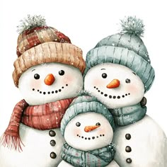 two snowmen with hats and scarves on their heads