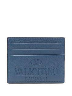 indigo blue calf leather grained texture debossed logo to the front rectangle shape card slots This piece comes complete with a protective dust bag. Designer Blue Card Holder For Everyday, Designer Wallets With Engraved Logo For Professional Use, Designer Business Wallets With Engraved Logo, Designer Rectangular Card Holder With Logo, Designer Blue Wallets For Business, Designer Blue Business Wallets, Modern Rectangular Card Holder With Logo Plaque, Elegant Rectangular Logo Card Holder, Luxury Leather Embossed Wallets