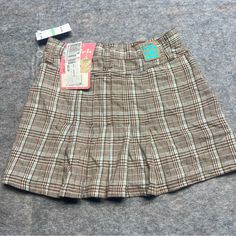 Nwt Mudd Plaid Skirt Size 8 Sku 0008 Retro School Mini Skirt, Casual Brown School Bottoms, Casual Brown Bottoms For School, Retro Skirted Bottoms For School, Casual Brown Skirted Skort, Casual Brown Short Skort, Casual Relaxed Fit Skirt For School, Brown Skirt For School Spring Season, Casual Short Pleated Skirt For School