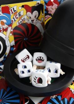 some dices and a hat on a table