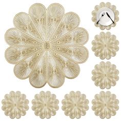 a set of four decorative wall hangings in various shapes and sizes, each with an intricate design