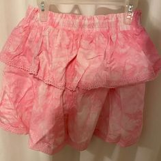 Pink Ruffle Skirt Womens Sm Nwot. Worn Once No Flaws Fitted Mini Skirt With Ruffles, Pink Tiered Bottoms With Layered Hem, Cotton Ruffled Mini Skirt, Cotton Ruffled Mini Skirt With Relaxed Fit, Relaxed Cotton Mini Skirt With Ruffles, Ruffled Cotton Skort, Pink Tiered Bottoms For Summer, Pink Tiered Skirt With Elastic Waistband, Cotton Ruffled Skirted Skort