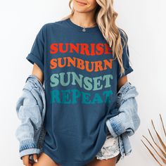 Embrace the ultimate summer vibes with our "Sunrise Sunburn Sunset Repeat" shirt, designed for beach lovers and vacation enthusiasts. Whether you're planning a girls' trip, a family beach vacation, or just love soaking up the sun, this tee is your perfect companion. This shirt features bold and colorful graphics that stand out, making a statement wherever you go. Available in various sizes to suit women, moms, and teens alike, it makes an ideal gift for birthdays, summer vacations, girls' trips, and beach outings. Capture the essence of summer with this trendy and stylish shirt, perfect for any beach outing or casual summer wear. Comfort Colors 1717 Tee: 👕 Soft-washed, garment-dyed, 100% ring-spun cotton tee for added coziness and durability, printed with cutting-edge DTG (Direct to Garme Comfortable Fit T-shirt With Text Print For Summer, Soft-washed Comfort Fit T-shirt For Summer, Casual Graphic Print Top For Summer Activities, Casual Graphic Print Top For Summer, Casual Tops With Graphic Print For Summer, Trendy Tops For Spring And Summer Activities, Cotton Tops For Summer Activities, Graphic Print Graphic Tee Tops For Summer Activities, Graphic Tee Tops With Graphic Print For Summer Activities