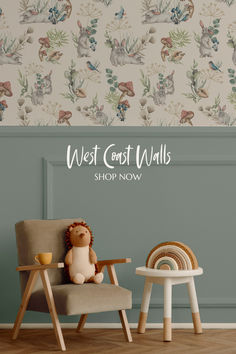 a teddy bear sitting on a chair in front of a wall with the words west coast walls shop now