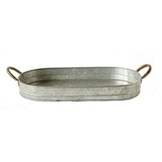 an old metal tray with handles is shown on a white background for use as a serving dish