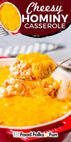 a spoon full of cheesy casserole being lifted from a red dish