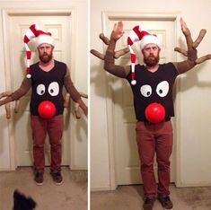 a man wearing a reindeer hat and holding his hands up in the air while standing next to a door