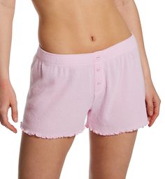 Ribbed knit shorts can be paired with your favorite sleepwear top for a comfortable style that can also be worn for going out. Covered elastic waistband for close fit. Faux fly front with 3 decorative buttons. Leg openings have lettuce edge. Ribbed knit has peachy, textured surface. Lightweight knit shorts are soft. Comfy for warm weather lounge and sleep. Loose fit. PJ Salvage Women's Textured Essentials RIb Peachy Short in Pastel Pink | Size XL | HerRoom.com Cotton Sleepwear With Built-in Shorts, Comfortable Summer Pajama Shorts For Sleep, Comfortable Summer Sleep Pajama Shorts, Comfortable Sleepwear With Built-in Shorts For Summer, Relaxed Fit Sleepwear With Built-in Shorts, Comfortable Pajama Shorts For Spring Sleepover, Cotton Sleepwear With Built-in Shorts For Relaxation, Pink Summer Sleepwear For Relaxation, Pink Sleepwear For Summer Relaxation