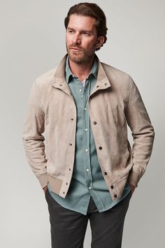 Whether you're hitting the green with friends or packing for a trip to an urban oasis, our Lincoln suede jacket is a perfect companion. This handcrafted, lambskin suede style has sturdy metal snaps and is detailed with tricot knit bands at the cuffs, collar, and hem to help ensure a superior fit. Packing For A Trip, Suede Style, Golf Jacket, Golf Jackets, Urban Oasis, Suede Fashion, Men's Coats & Jackets, Mens Golf, Suede Jacket