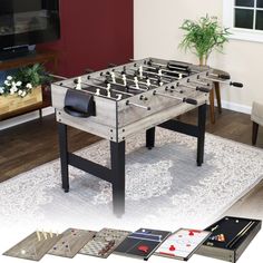 a foosball table sitting on top of a rug