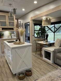 a kitchen and living room in a mobile home