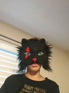 A fun cat mask to wear. Great for Halloween. NOT water proof! black cat I started making animal masks cuz im an alterhuman and I like to dress up as my theriotypes. Cat Therian Mask, Cat Therian, Therian Mask, Costume Masks, Cat Mask, Animal Masks, Mask For Kids, Water Proof, Cool Cats