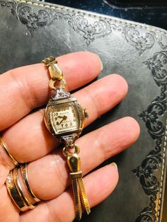 Year 1947(movement marked)  Bulova ~Excellency series A Fine Bulova Vintage Ladies watch (our ref M-29)   2 crown dainty real diamonds  21 rubies, (top precision movements of the time in 1947 & nowadays).  Perfect Dail !  14kGold 1/20 filled bracelet(rare new old stock )  &10K rolled gold case  Art Deco 1947 (movement hallmarked )  Oiled & Serviced - Winds and sets well and timekeeping Good(fit for daily wear like grandma  Signed Movement, dial , crown & case  Cosmetic condition: 98%new (minty )  Case size 20-22mm including winding button. Genuine antique- no rewrite of dail or mixed parts  Rare! Rare! Rare!  * For orders more than £500, ship by EMS/speedpost worldwide with no extra cost !  note : vintage watches / antique watches for more than 50 years ,  we will check before shipment for Vintage Bulova Watches, Wristwatch Vintage, Art Deco Watch, Bulova Watches, Vintage Watches Women, Watch Jewelry, Old Watches, Antique Watches, Old Jewelry