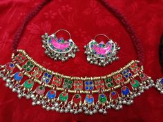 PRODUCT : 1 Vintage Necklace Set Description This is an Afghan kuchi tribal necklace Set It's an old handmade Afghan Turkish banjara vintage necklace. You can not go unnoticed at any occasion while wearing it. The back of the necklace has a black cotton cloth for a real comfort. On the top it's decorated with red and white beads. The filigree work is very intricate. The necklace has a black cord on each corner that ties at the back Its a beautiful peace of art created by the tribal people, all h Necklace Traditional, Silver Chain Style, Green Item, White Beads, Boho Necklace, Pendant Earrings, Vintage Necklace, Black Cotton, Necklace Set