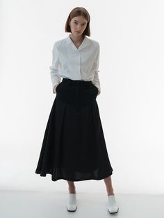 Editor's NotesPair this stylish shirt by BISCUITSHOP with versatile bottoms from wide skirts to shorts for the upcoming season.- Classic short collared design - Button closure at long length- Long sleeve with standard fitMeasurements(in)One Size (XS-M)- Total length: 29.53 in. - Shoulder: 15.35 in.- Chest: 18.50 in.- Waist: 18.11 in. - Armhole: 8.66 in. - Sleeve: 23.23 in.Composition & Care- 61% Cotton / 39% Polyester- Dry cleanDesigner- Imported- by BISCUITSHOP Elegant Button-up Office Skirt, Spring Semi-formal Bottoms For Office Wear, Tailored Blouse For Semi-formal Spring Occasions, Spring Bottoms For Semi-formal Office Wear, Semi-formal Spring Bottoms For Office, Elegant Long Skirt With Relaxed Fit, Elegant Workwear Culottes, Summer Workwear Skirt With Button Cuffs, Elegant Summer Workwear Culottes