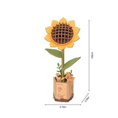 3D Wooden Flower Puzzle: Sunflower Introducing this exquisite DIY Flower Wooden Puzzle, featuring a charming Sunflower bloom. Perfect for both beginners and seasoned hobbyists, this puzzle is designed to be easily assembled within a mere hour and a half, making them an ideal project for a leisurely afternoon. Upon completion, you have a beautiful display piece, adding a touch of natural elegance to any room. With their timeless charm and enduring appeal, this puzzle makes for cherished gifts for Wooden Sunflower, Wooden Flower Bouquet, Flower Puzzles, Wooden Model Kits, Flower Model, Beautiful Meaning, Fleurs Diy, Pink Carnations, Elizabeth Craft Designs