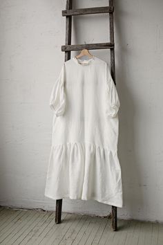 This oversized dress is made from 100% soft and washed linen. Details: - Composition: 100% Oeko-Tex certified linen - Colour: white - Dropped shoulders - Linen belt - Ruffle skirt and neckline - Size: One size - fits all - Medium weight linen - Linen care: machine wash gentle; tumble dry low, ironing optional - The price is for one dress, other pictured items are not included Measurements: Length (from neck down) - 125 cm (49,2 in) Chest width - 140 cm (55,1 in) Sleeve length (from collar) - 60 Oversized Ruffled Dresses For Summer, Oversized Short Sleeve Dress For Brunch, Oversized Summer Dresses With Ruffles, White Linen Ruffle Dress For Daywear, White Tunic Lagenlook Dress, White Lagenlook Tunic Dress, Oversized Linen Dress For Spring Daywear, White Relaxed Fit Lagenlook Dress, Oversized Linen Midi Dress For Spring