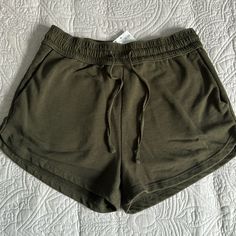 Brand H&M Color Army Green Size Small Condition Nwt Material Is Thick Like Sweatpants. Has Two Pockets. Length Is Short And Has Drawstrings H&m Cotton Stretch Bottoms, H&m Short Bottoms With Elastic Waistband, H&m Stretch Cotton Bottoms, H&m Elastic Waistband Short Bottoms, H&m Shorts With Elastic Waistband, H&m Relaxed Fit Bottoms, H&m Casual Short Length Bottoms, H&m Stretch Shorts, H&m Relaxed Fit Cotton Shorts