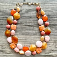 "💞One of a kind & ready to ship💞  We love this gorgeous necklace, made with Natural carnelian Beads, glass, and acrylic beads. It is 16\" plus a 4\" extender chain.  Thank you for supporting American small business! *Smoke and pet free home!* I ship 6 days a week - Thank you for browsing my store!" Orange Multi-strand Colorful Beads Jewelry, Unique Orange Gemstone Bead Necklaces, Handmade Orange Multi-strand Necklace, Multi-strand Orange Necklaces For Gifts, Adjustable Orange Multi-strand Necklaces, Orange Multi-strand Necklaces For Gifts, Handmade Orange Double Strand Necklace, Bohemian Orange Double Strand Jewelry, Adjustable Orange Necklaces With Natural Stones