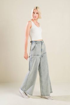 An acid-washed denim pant with front closure and side/back pockets Details: Self: 90% Cotton 10% Viscose Size & Fit - Model is 5`8" And Wearing Size Small- Measurements Taken From Size Small- Approx. Length: 42" Inseam - 30" Trendy Acid Wash Wide Leg Bottoms, Washed Denim Full-length Pants, High Rise Washed Cargo Jeans For Spring, Spring Acid Wash Denim Flare Jeans, Full-length Washed Denim Pants, Mid-rise Stonewashed Denim Bottoms, Spring Washed Cargo Jeans Full Length, Spring High Rise Washed Cargo Jeans, Washed Cargo Jeans For Spring