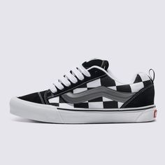 A Puffy 90s Style Inspired by the Past, But Built for TodayThe Knu Skool is a modern interpretation of a classic 90s style, defined by its puffed up tongue and 3D-molded Sidestripe, and tied off with oversized, chunky laces. With its in-your-face profile, mega checkerboard print, and dramatic style details, the Knu Skool plays off of the original Old Skool while blending an icon of the past with today’s trends. Reissued 90s low top shoe Sturdy suede and canvas uppers Oversized checkerboard print Puffy tongue and ankle collar Puffy 3D molded Sidestripe™ Heel pulls for ease of entry Signature rubber waffle outsoles | Vans Knu Skool Shoes (Mega Check Black) - 11.0 Men/12.5 Women Cheap Black Skateboarding Sneakers, Cheap Non-slip Synthetic Skate Shoes, Trendy Cheap Skate Shoes With Vulcanized Sole, Cheap Skate Shoes With Round Toe, Cheap Black Synthetic Skate Shoes, Affordable Sporty Slip-on Skate Shoes, Cheap Vulcanized Skate Shoes, Cheap Women's Skate Shoes For Streetwear, Cheap Sporty Slip-on Skate Shoes