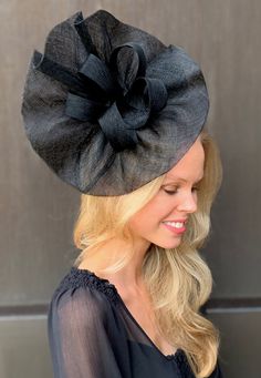 Make a statement at this year's Kentucky Derby in the classic black 'Tia' fascinator! The perfect piece for a race-day, tea-party, wedding or special occasion. Measurement (not including headband): 11.8in (30cm) READY TO SHIP WORLDWIDE ~Standard delivery to the US 7-10 business days~ See all expected delivery times below. Shop our full range of fascinators, derby hats and headpieces in different colors and styles here:  www.etsy.com/shop/TheHeadwearBoutique Expected Delivery Times: Australia express shipping: 1-3 business days  Australia standard shipping: 3-7 business days US & Canada standard shipping: 7-10 business days New Zealand standard shipping: 6-10 business days UK + Rest of the World standard shipping: 7-10 business days International Express: 5-7 business days Black Top Hat For Evening With Structured Crown, Black Top Hat With Structured Crown For Formal Occasions, Black Cloche Hat For Church, Black Structured Crown Top Hat For Formal Occasions, Black Short Brim Party Headpiece, Black Structured Crown Top Hat For Evening, Black Wedding Hat For Kentucky Derby, Fitted Black Chic Fascinator, Black Top Hat For Formal Occasions