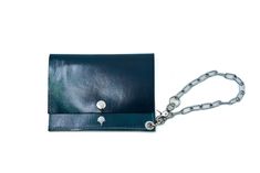 This chain wallet is designed to clip to a belt, clip to a bag, or worn as a wristlet. Featuring unisex utility, everybody can relate to functional organization. Crafted from full grain hand dyed calf leather featuring a unique dye effect and beautiful semi-gloss patina. Roomy dimensions feature 2 card slots and a rear pocket for bills and small documents. Fits comfortably flat in standard sized pants pockets. Stainless steel chain for safekeeping. Dimensions: 4” x 5” Assembled by hand in our Br Functional Organization, Chain Wallet, Clip Wallet, Money Clip Wallet, Belt Clip, Wallet Chain, Deep Sea, Steel Chain, Low Key