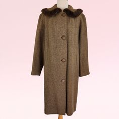 This genuine 1950s womens vintage wool coat with its fur trimmed collar is reminiscent of old Hollywood Glamour.  It is lined with a rich rust brown acetate lining and the fur trim is likely Fox.  Note the beautiful detail of inverted pleat at centre back and the textured green woollen fabric.  A truly gorgeous evening winter coat for the fashion conscious and retro vintage lover! DRY CLEANED since being acquired by HRV.  -  Button Up - Vintage Buttons -  Fox Fur Trim Collar -  Peter Pan Style C Woollen Fabric, Retro Hollywood, Fur Collar Coat, Collar Coat, 50s Vintage, Women's Evening Dresses, Collared Coat, Old Hollywood Glamour, Vintage Lover