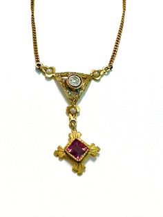 10k early 1900s Edwardian Lavalier with a Diamond, seed pearls and a square faceted bezel set Amethyst drop, the chain is gold filled.  Condition is very good for its age any wear commensurate with age, pictures show the details.  Length 18",pendant approx. 1 1/8", wt.- 2.9 grams.  Unique creation, a delicate beauty. Vintage Yellow Gold Necklace With Square Pendant, Vintage Yellow Gold Square Pendant Necklace, Vintage Gold Necklace With Rose Cut Diamonds, Vintage Yellow Gold Gemstone Necklace, Vintage Rose Cut Diamond Necklaces For Gifts, Vintage Necklaces With Rose Cut Diamonds For Gifts, Rose Lily, Delicate Beauty, Delicate Design