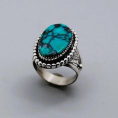 "Be noticeable with the jewelry you wear, buy unique Crafted brilliance that whispers tales of elegance and style. Behold the allure of my gorgeous ring creation, manifesting my endless imagination. I can't help but wonder how many more dazzling designs await to be brought to life from the treasury of my creative mind. ✨💍 Handcrafted by Eli Gofman oval Hubey turquoise sterling silver statement \" Froggy Dance\" ring size 8 1/2" Elegant Turquoise Ring With Polished Finish, Heirloom Style Oval Turquoise Gemstone Ring, Heirloom Oval Turquoise Cabochon Ring, Heirloom Turquoise Oval Rings, Heirloom Oval Turquoise Ring For Anniversary, Elegant Polished Sterling Silver Turquoise Ring, Elegant Sterling Silver Hallmarked Turquoise Ring, Elegant Hallmarked Sterling Silver Turquoise Ring, Elegant Sterling Silver Turquoise Ring With Polished Finish