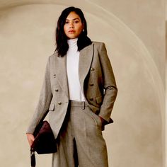 Peak Lapel. Long Sleeves With Button Cuffs. Double Breasted Closure. Front Pockets. Center Back Seam. Lightweight Shoulder Pads. Straight Hem. Fully Lined. Classic Khaki Blazer For Fall, Fall Khaki Blazer With Button Cuffs, Classic Khaki Office Blazer, Classic Fall Tweed Jacket With Double-breasted Buttons, Fall Classic Tweed Jacket With Double-breasted Buttons, Classic Double-breasted Tweed Jacket For Fall, Classic Khaki Blazer For Office, Beige Button-up Tweed Jacket For Work, Fall Khaki Blazer For Business Casual