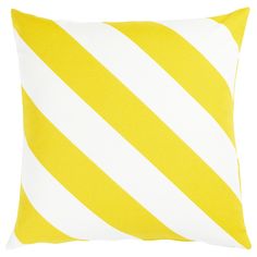 a yellow and white striped pillow on a white background