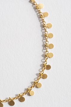 Handmade gold dots evenly spaced around a fine gold chain. 18K Yellow Gold Made in England Garden Clogs, Gold Dots, Women Accessories Jewelry, Handmade Gold, Leaf Pendant, Earring Necklace, Jewelry Sales, Gold Chain, Gold Chains