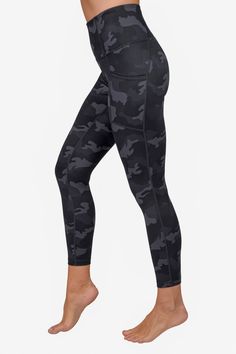 Camo printed high waisted leggings with functional side pockets. - Banded high waist- Side pockets - Camo printed - Ankle length - Approx. 10" rise, 25" inseam (size S)- ImportedThis item cannot be shipped to Canada. Machine wash cold 83% polyester, 17% spandex Black Camo Pants, Grey Camo Leggings, Black Camo Leggings, Gym Workout Wear, Surf Pants, Camouflage Leggings, Womens Camo, Swim Pants, Camo Leggings