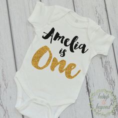 First Birthday Outfit Girl First Birthday Shirt PERSONALIZED One Year Old Shirt Gold Glitter Shirt Golden Birthday 091 by BumpAndBeyondDesigns on Etsy https://www.etsy.com/listing/236801422/first-birthday-outfit-girl-first Gold Letter Print T-shirt For Birthday, Gold T-shirt With Letter Print For Birthday, Gold Letter Print T-shirt For Party, Gold Short Sleeve Top With Glitter Print, Gold Short Sleeve Tops With Glitter Print, Glitter Dress Short, Gold Bodysuit, First Birthday Outfit Girl, First Birthday Shirt