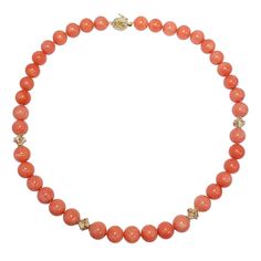 Gold and Diamond Accented Salmon Coral Bead Knotted String Necklace, 14 Karat | From a unique collection of vintage Beaded Necklaces at https://www.1stdibs.com/jewelry/necklaces/beaded-necklaces/. String Necklace, Coral Beads Necklace, Vintage Beads Necklace, Beaded Jewelry Designs, Coral And Gold, Coral Beads, Jewelry Designs, Bead Necklace, Live Lokai Bracelet