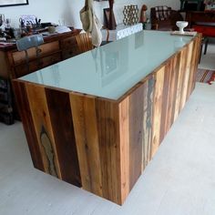 a counter made out of wood and glass