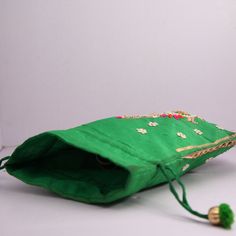 "Motif Beaded Golden Ribbon Bud Work Embroidered Women Potli Bag Handbag Wedding Giveaways Size: 10\" x 8\" Designed with the heart, this beautiful Potli or batawa bag are eye catchy and made of premium material. Key Features: Embroidery art work This potli is good match with both Indian and western outfits and are superb for wedding and festive parties. This would be best complement to your designer saree, lenhga or any other kind of dress. This is the combination of traditional and modern embr Beaded Rectangular Potli Bag For Festive Occasions, Festive Beaded Rectangular Potli Bag, Festive Beaded Shoulder Bag As Gift, Festive Rectangular Beaded Potli Bag, Festive Beaded Shoulder Bag Gift, Festive Beaded Shoulder Bag For Gifts, Beaded Bags For Festivals And Gifts, Beaded Bags For Gifts And Festivals, Beaded Bags For Gift And Festivals