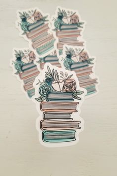 stickers with books and roses on them