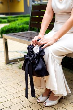 Satin Knot small and big black bag - Elegant Silk handbag,Clutch with bow,Wedding purse,Handmade bag for event party,Satin Evening Bag, Gift I invite you to check out this charming handbag for women, which is made of exquisite satin (satin) and is designed to emphasize your unique beauty and elegance.  This handbag is ideal for those who value quality and style.  Features:  * Material: satin (satin)  * Fastener: metal button fastener   * Dimensions: width 23 cm / 9 inches, height 18 cm / 7 inche Spa Bags, Bow Wedding, Pool Bags, Wedding Purse, Wedding Bows, Wedding Bag, Handmade Bag, Unique Beauty, Orange Bag