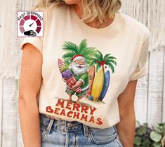 Merry Beachmas shirt,Funny Christmas in july shirt,Santa in July tshirt,Tropical Christmas shirt,Summer Christmas t shirt,Hawaian Santa top https://etsy.me/349fSXd  PRODUCT DESCRIPTION Please check the colors and sizes on the images! .: Retail fit .: 100% Soft cotton (fibre content may vary for different colors) .: Light fabric (4.2 oz/yd² (142 g/m .: Tear away label .: Runs true to size Machine wash: warm (max 40C or 105F); Non-chlorine: bleach as needed; Tumble dry: low heat; Iron, steam or dr Fun T-shirt For Beach Season Holiday, White T-shirt For Beach Holiday, Beach Season Holiday Cotton T-shirt, Beach Holiday Cotton T-shirt, Graphic Print T-shirt For Beach Holiday, Beach Holiday Graphic Print T-shirt, Cotton T-shirt For Beach Holiday, Fun Holiday Beach Tops, Fun Beach Season Holiday Tops